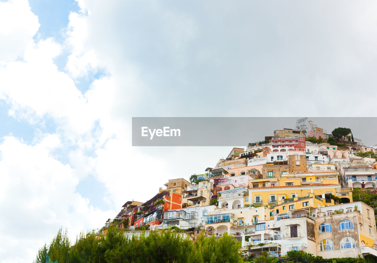 Beautiful view of the colorful houses and mediterranean sea in positano, italy