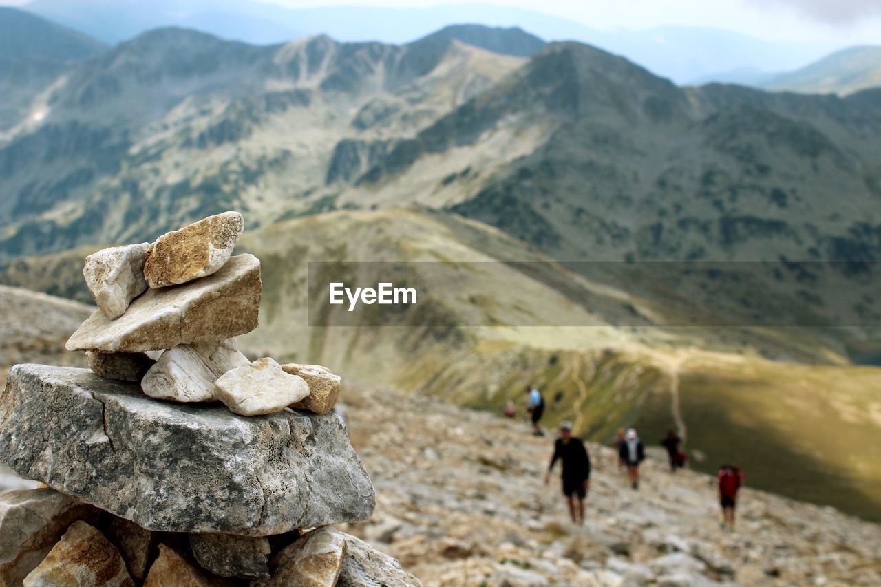 Scenic view of rocks with mountains in background