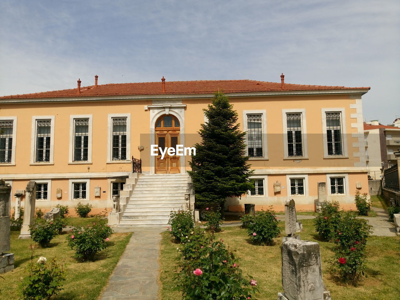 Building with trees in background