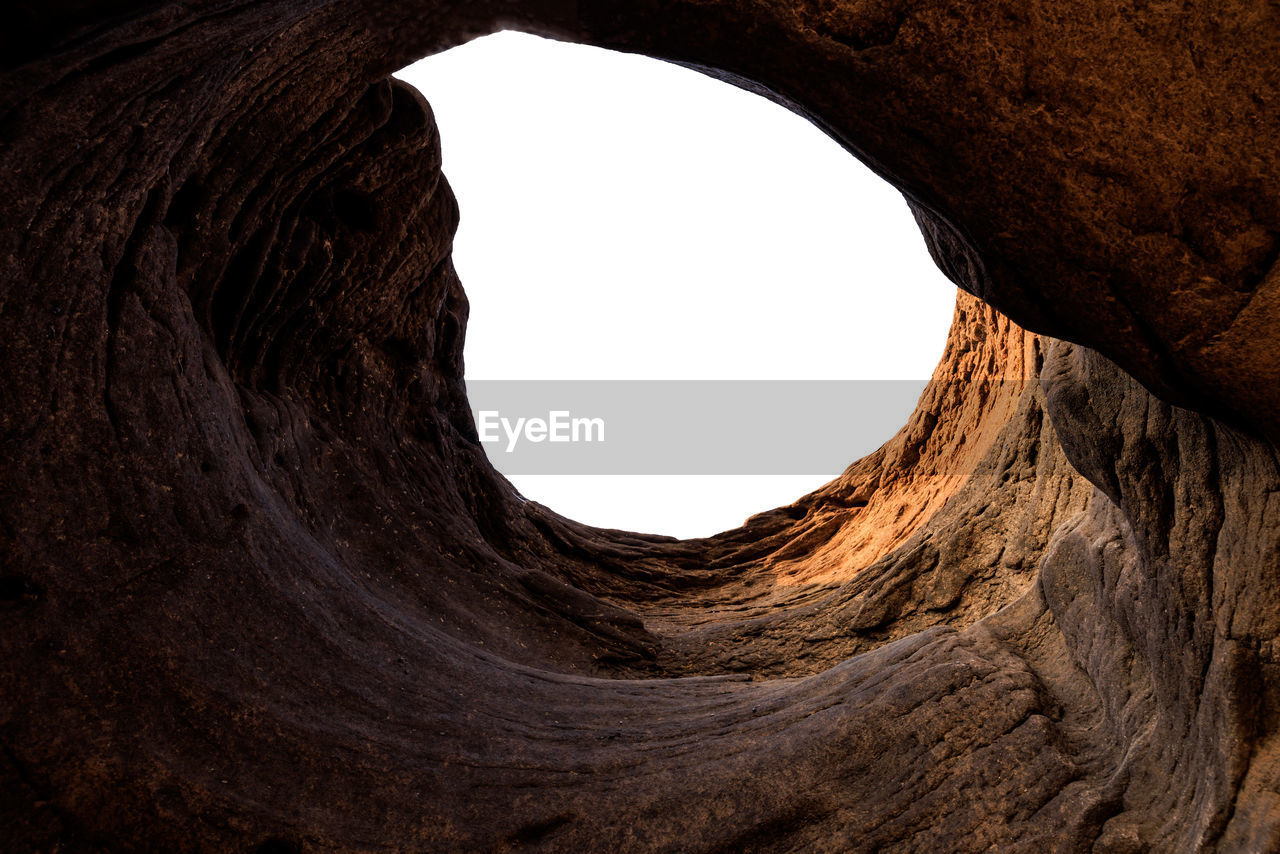 Tunnel rocks stone part under the meakong river basin cut-out on white background isolate,