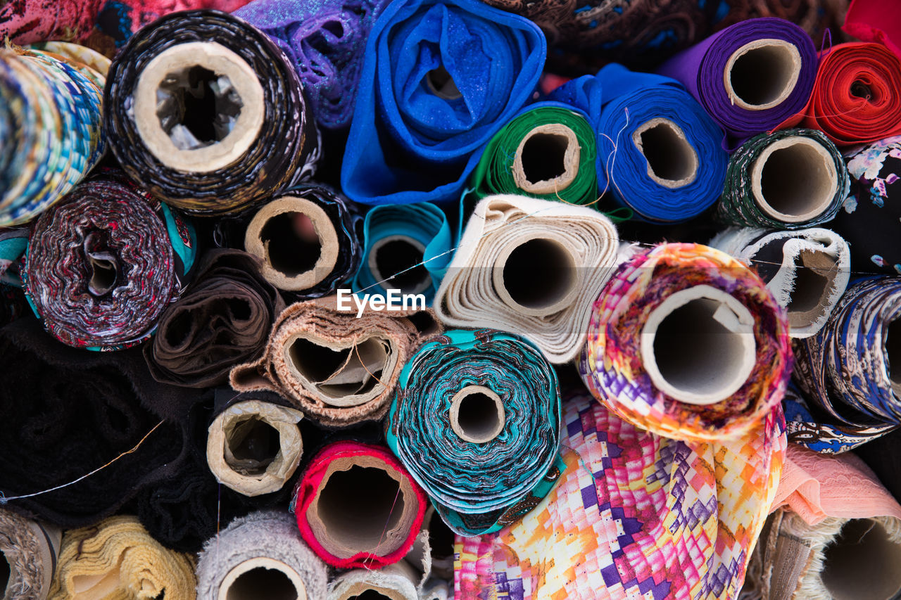 Full frame shot of colorful fabric rolls at store