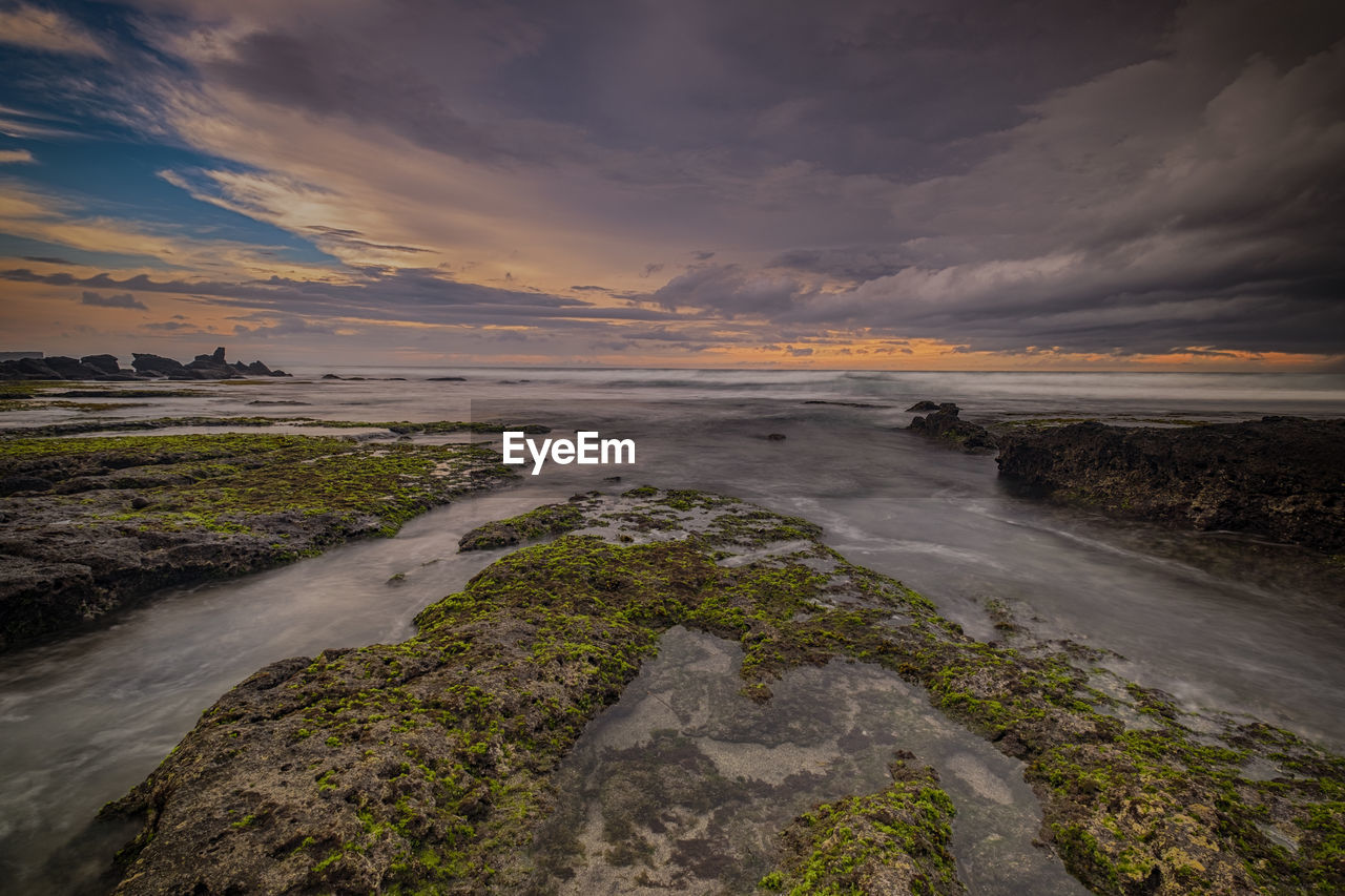 Scenic view of sea against sky during sunset