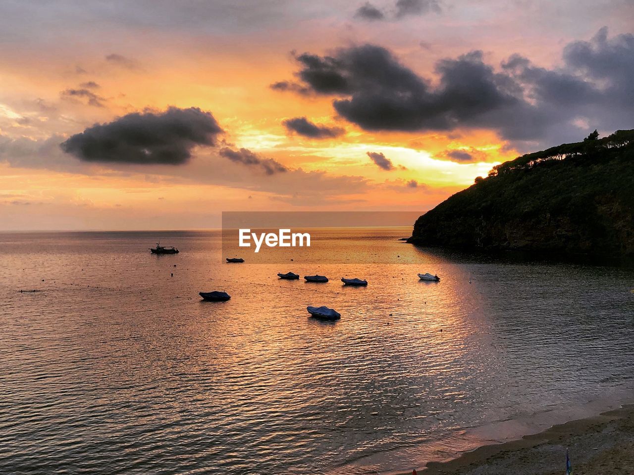 Scenic view of sea against sky during sunset