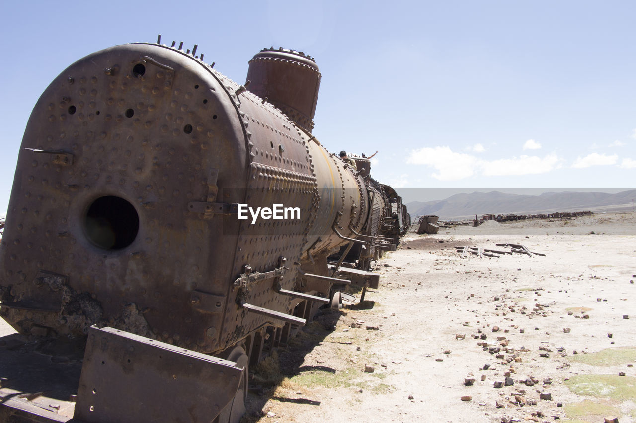 Wreck of steam engine at train cemetery