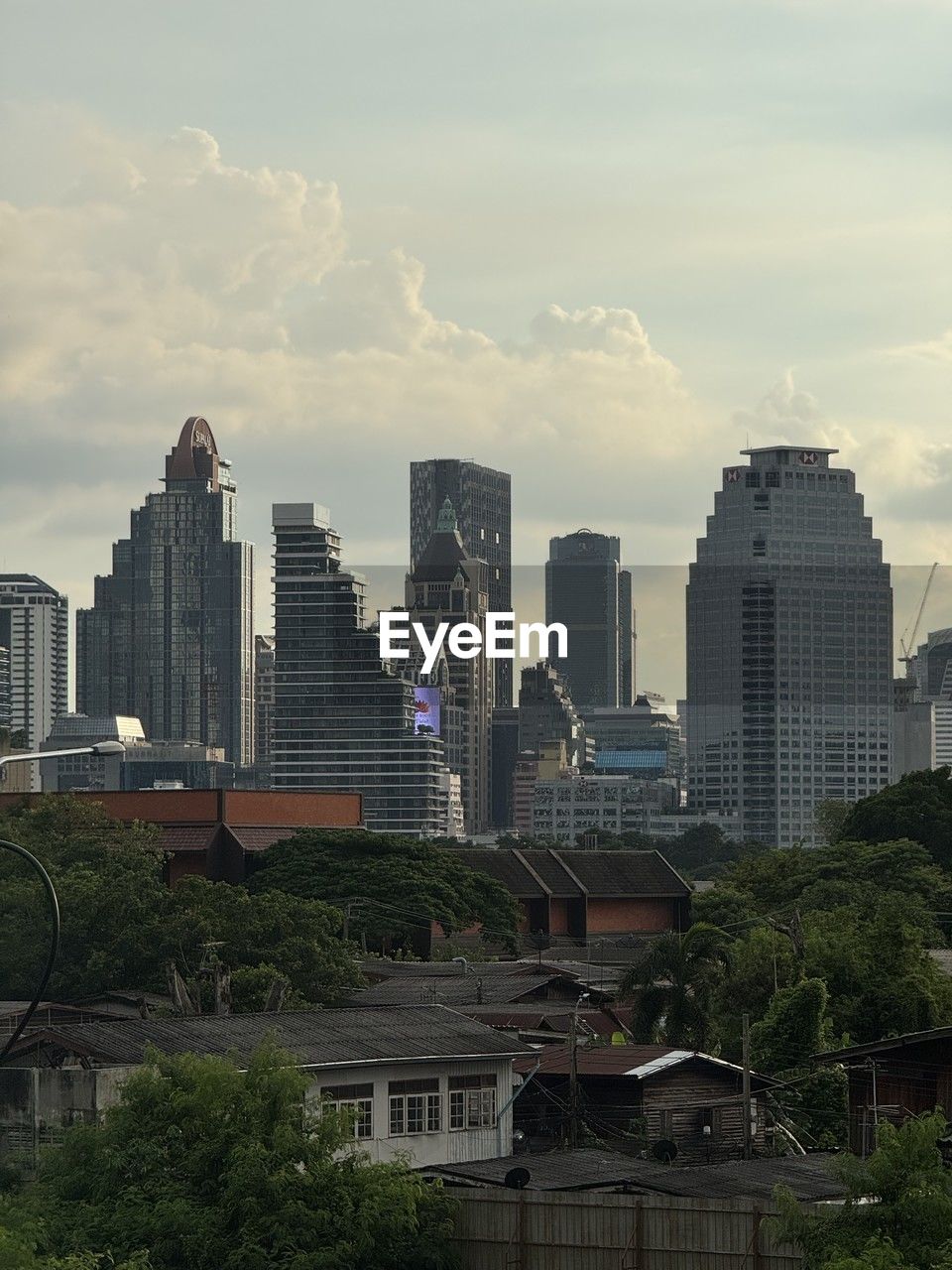 building exterior, architecture, built structure, city, building, skyscraper, sky, nature, urban area, cloud, tower block, reflection, cityscape, residential district, day, outdoors, tree, office building exterior, no people, plant, metropolitan area, tower, skyline, landmark