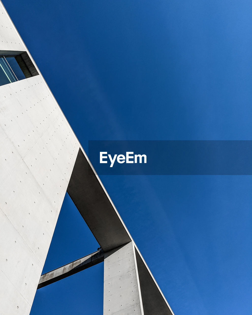 Low angle view of building against blue sky