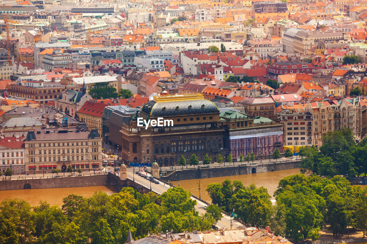 HIGH ANGLE VIEW OF TOWN AGAINST BUILDINGS