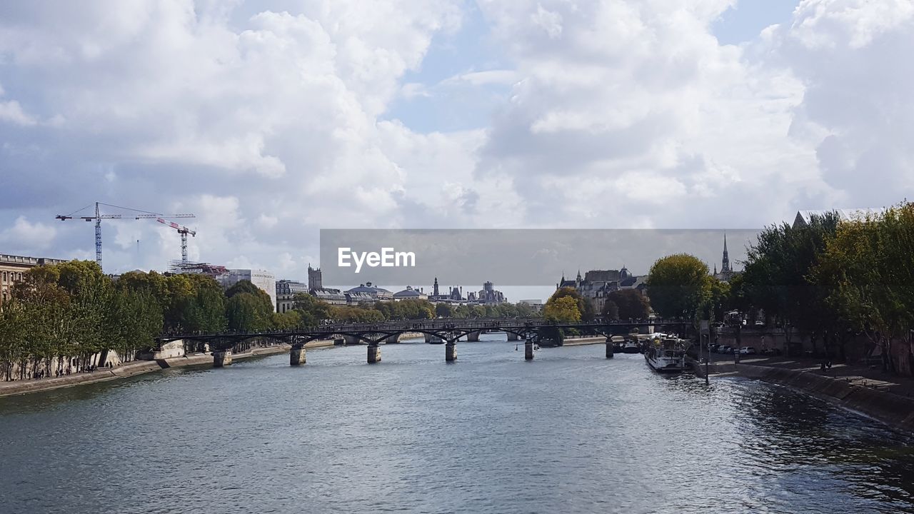 BRIDGE OVER RIVER AGAINST SKY