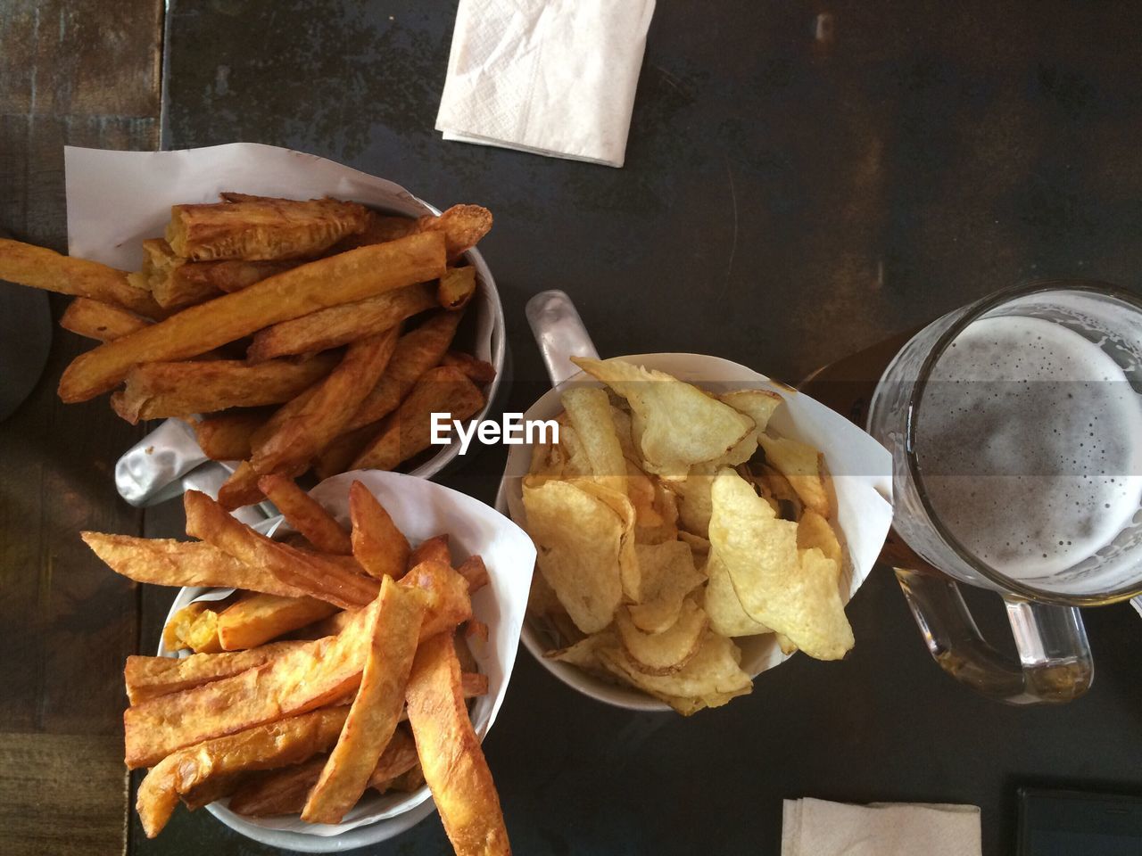 HIGH ANGLE VIEW OF MEAT AND BREAD ON TABLE