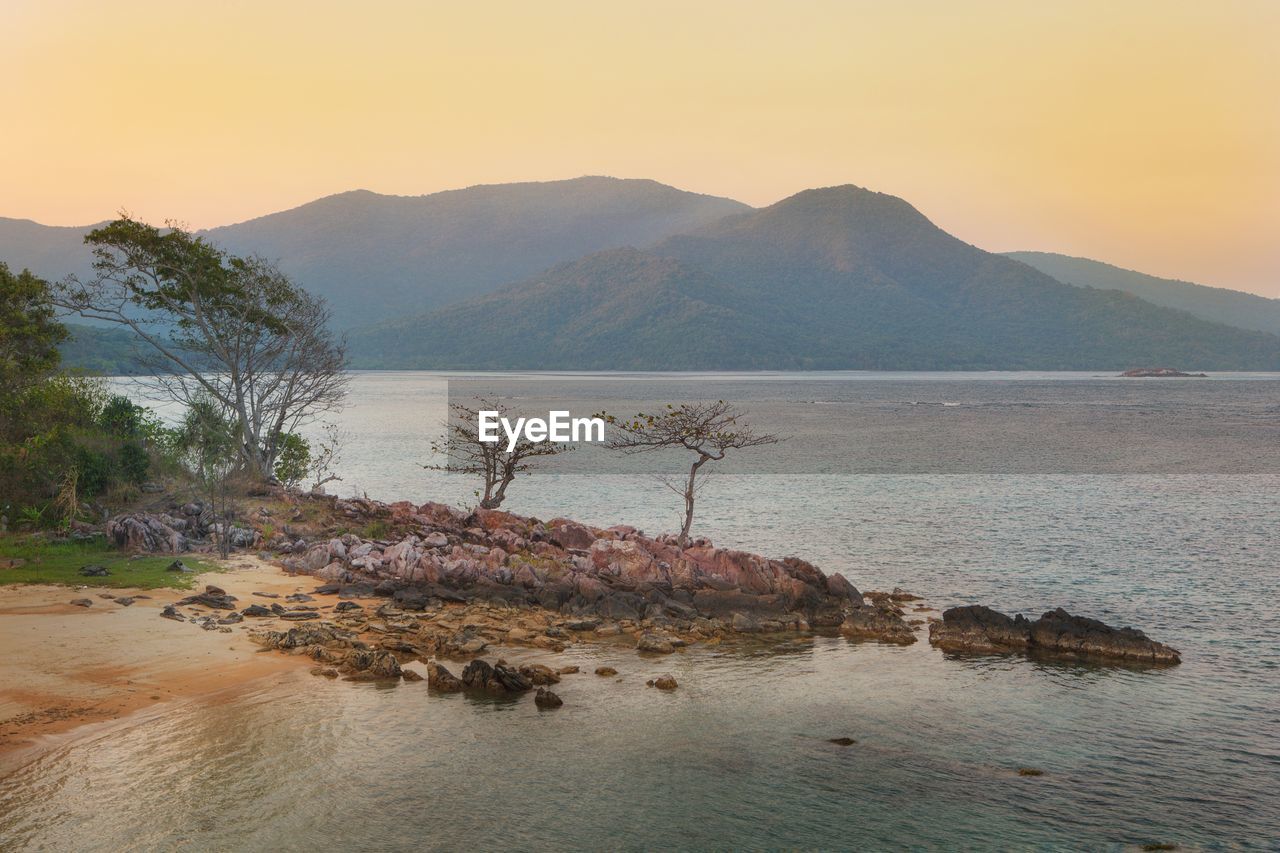 SCENIC VIEW OF SEA DURING SUNSET