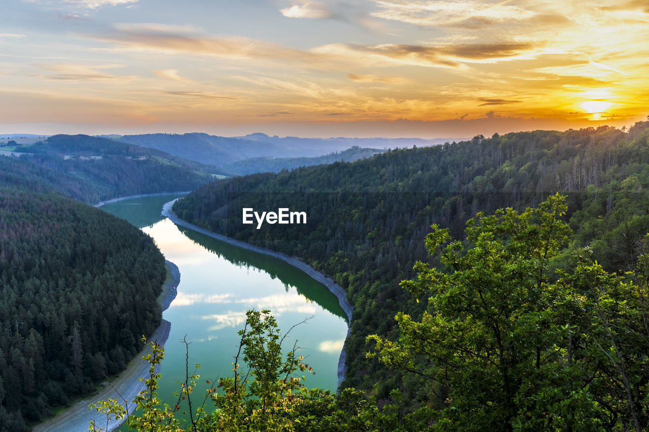 Germany, thuringia, view of river saale at sunset