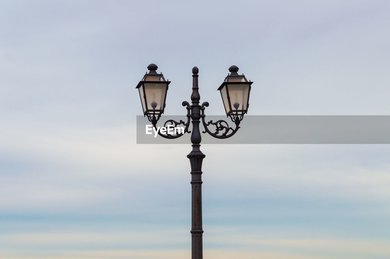 LOW ANGLE VIEW OF STREET LIGHT