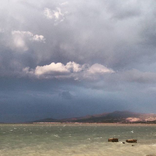 VIEW OF SEA AGAINST CLOUDY SKY