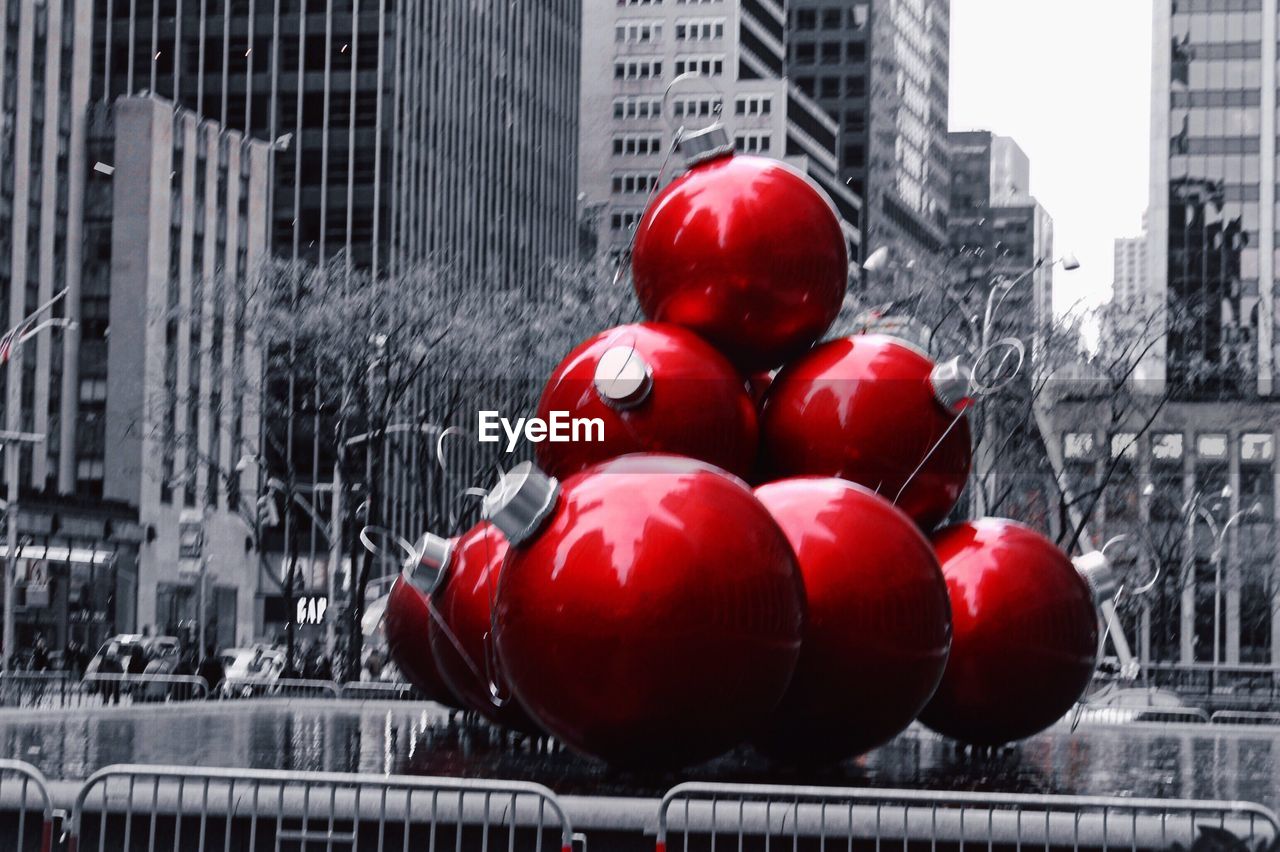 CLOSE-UP OF RED TOMATOES ON STREET