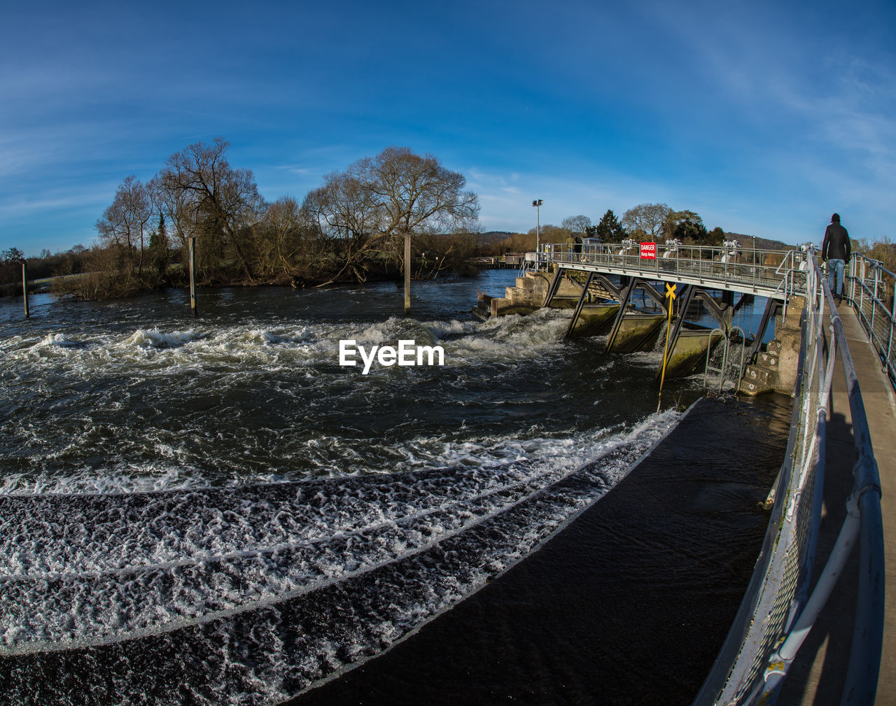 PANORAMIC SHOT OF SEA SHORE AGAINST SKY