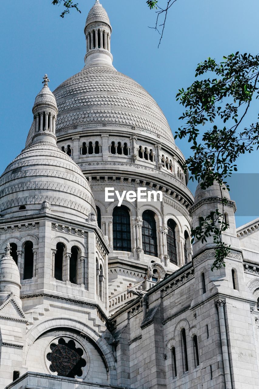 Low angle view of building against sky, paris