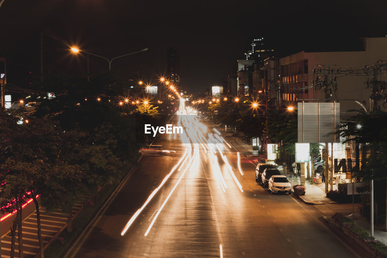 ILLUMINATED STREET AT NIGHT