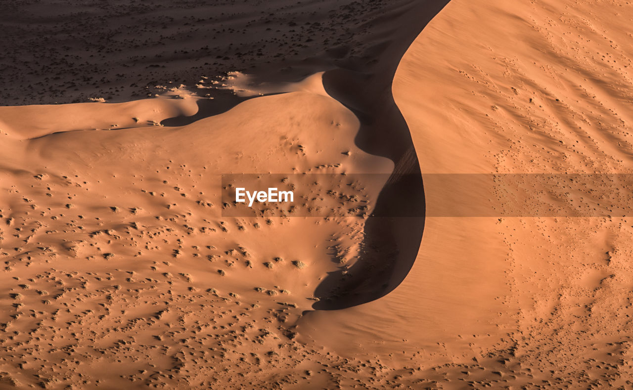 High angle view of sand dune in desert