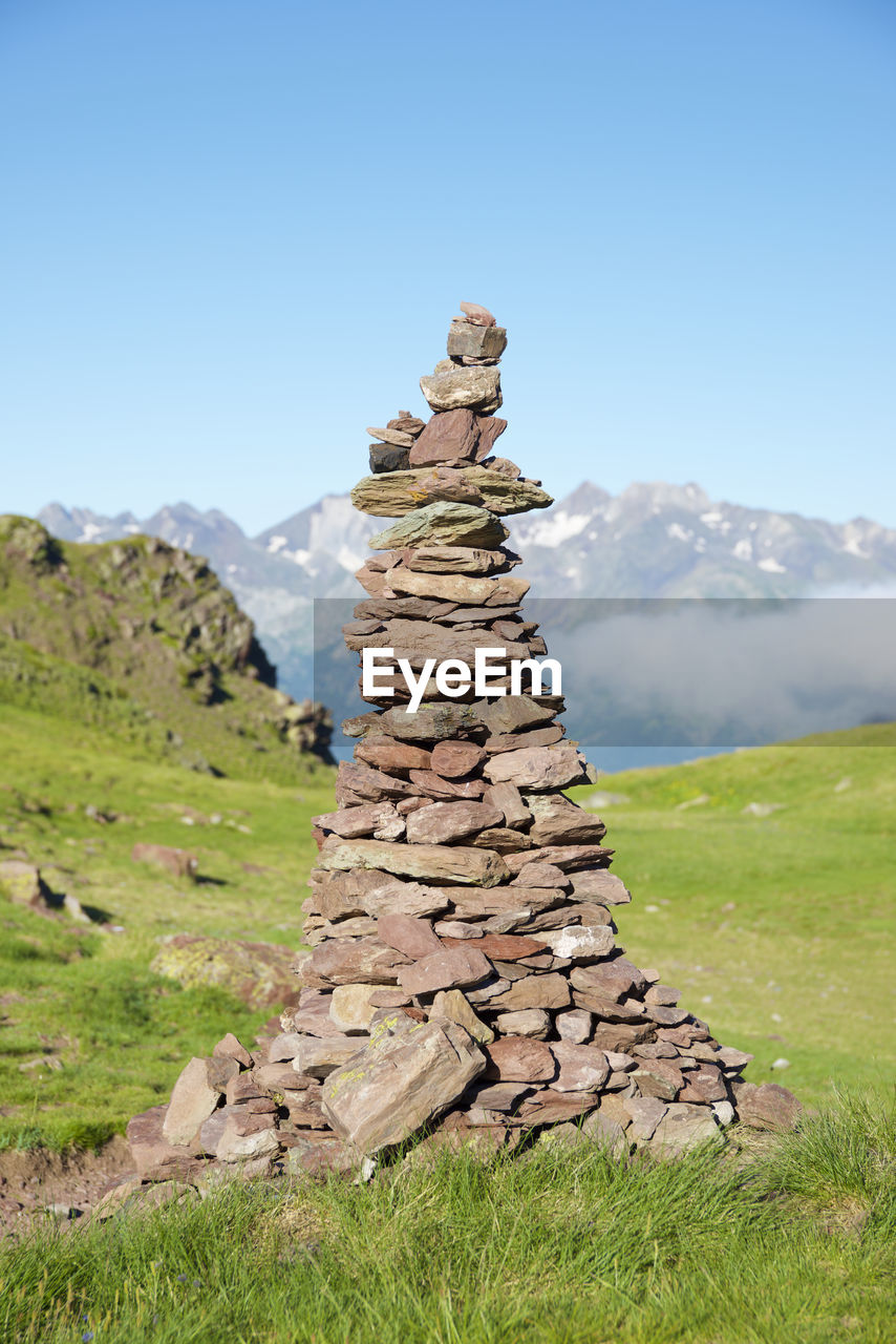 Cairn to indicate the right path in tena valley, huesca province in aragon, pyrenees in spain.