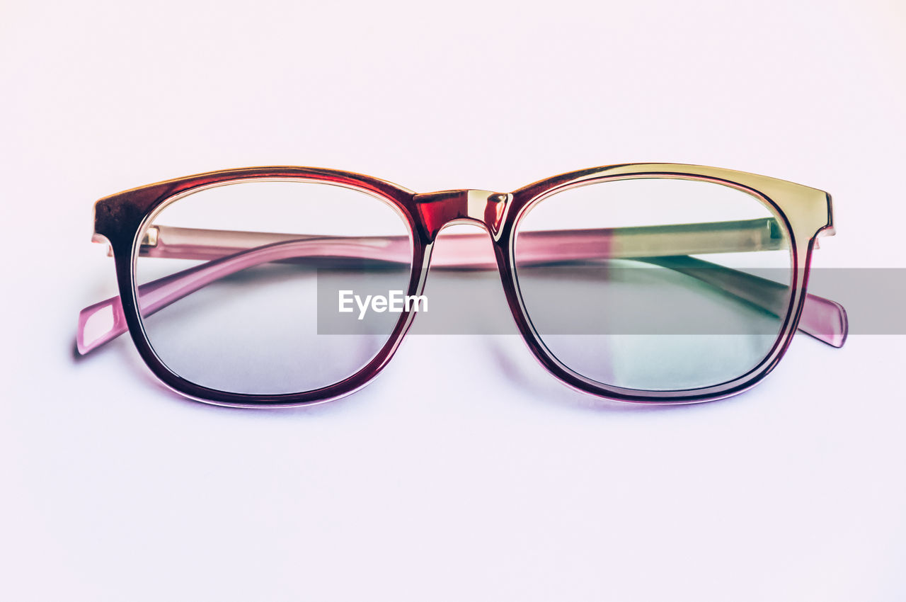 Close-up of eyeglasses against white background