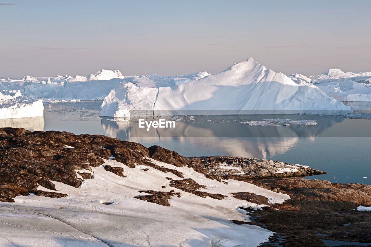 Scenic view of snow covered mountains