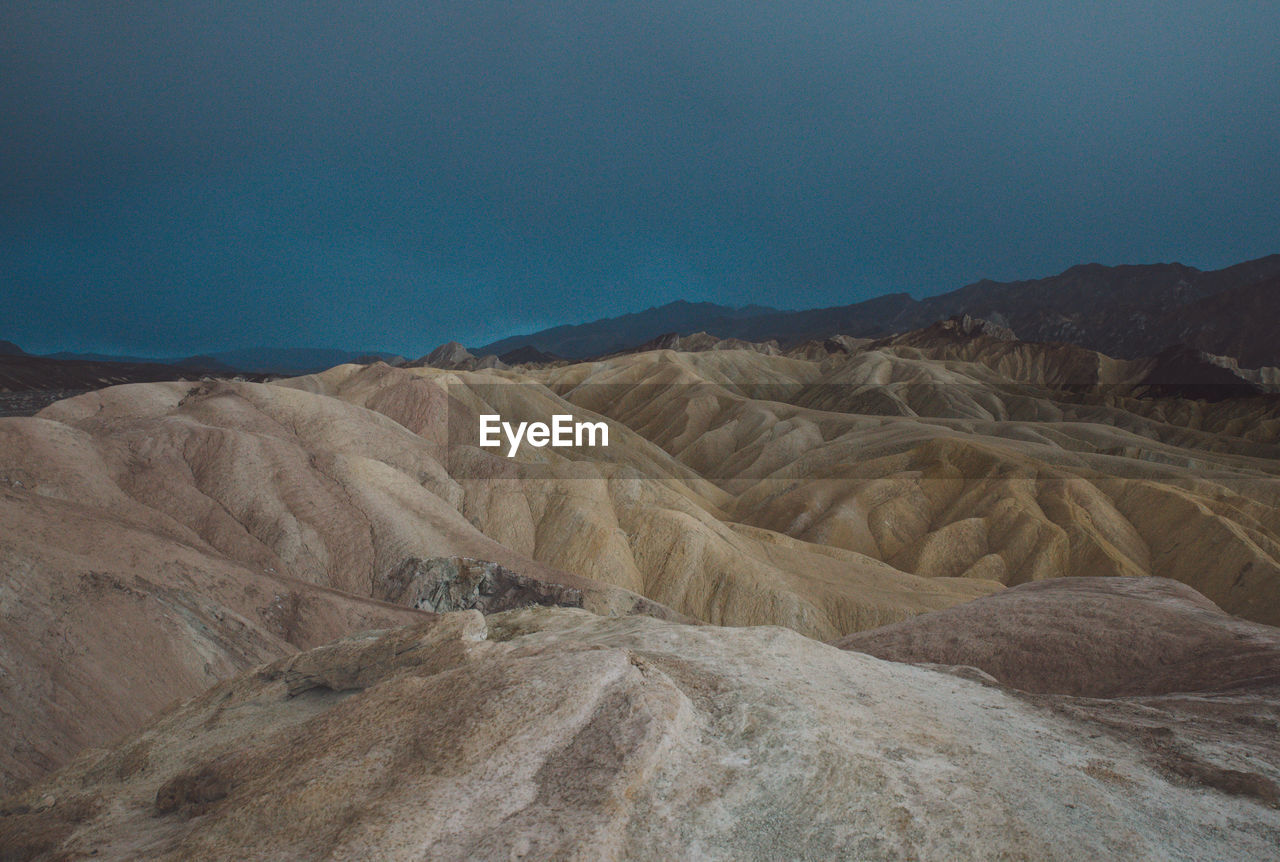 Scenic view of mountains against clear sky