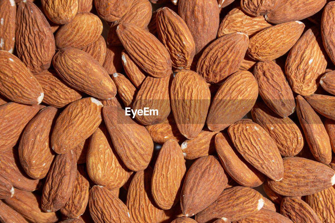 food, food and drink, full frame, plant, backgrounds, nuts & seeds, large group of objects, produce, healthy eating, abundance, brown, wellbeing, no people, freshness, fruit, nut, close-up, nut - food, almond, indoors, still life, dried fruit