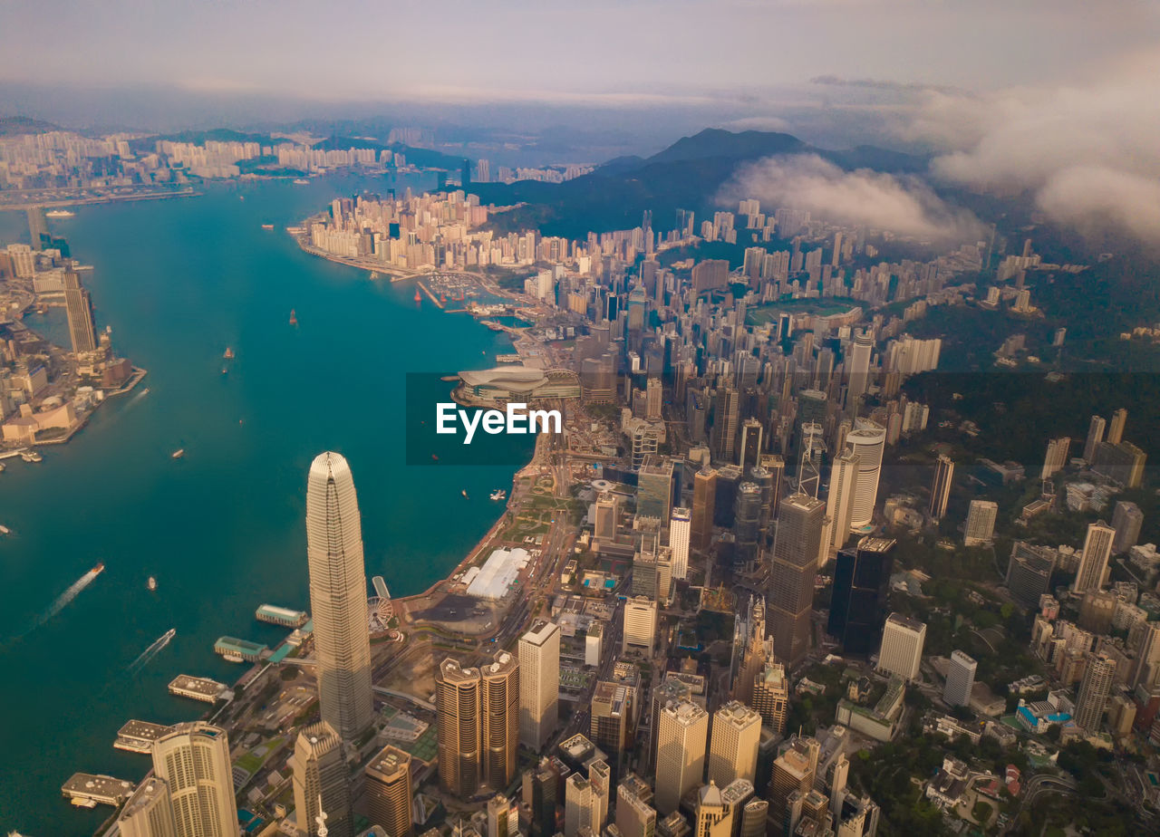 HIGH ANGLE VIEW OF CITY BUILDINGS AT SEASIDE