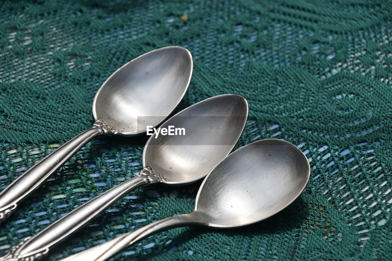 High angle view of spoons on table