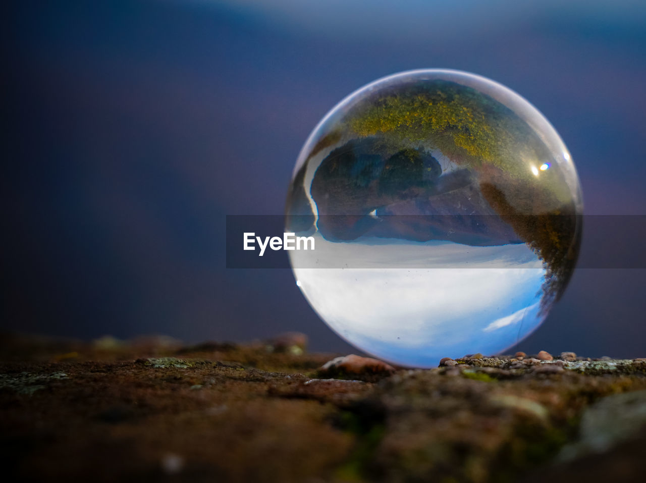 CLOSE-UP OF CRYSTAL BALL IN WATER
