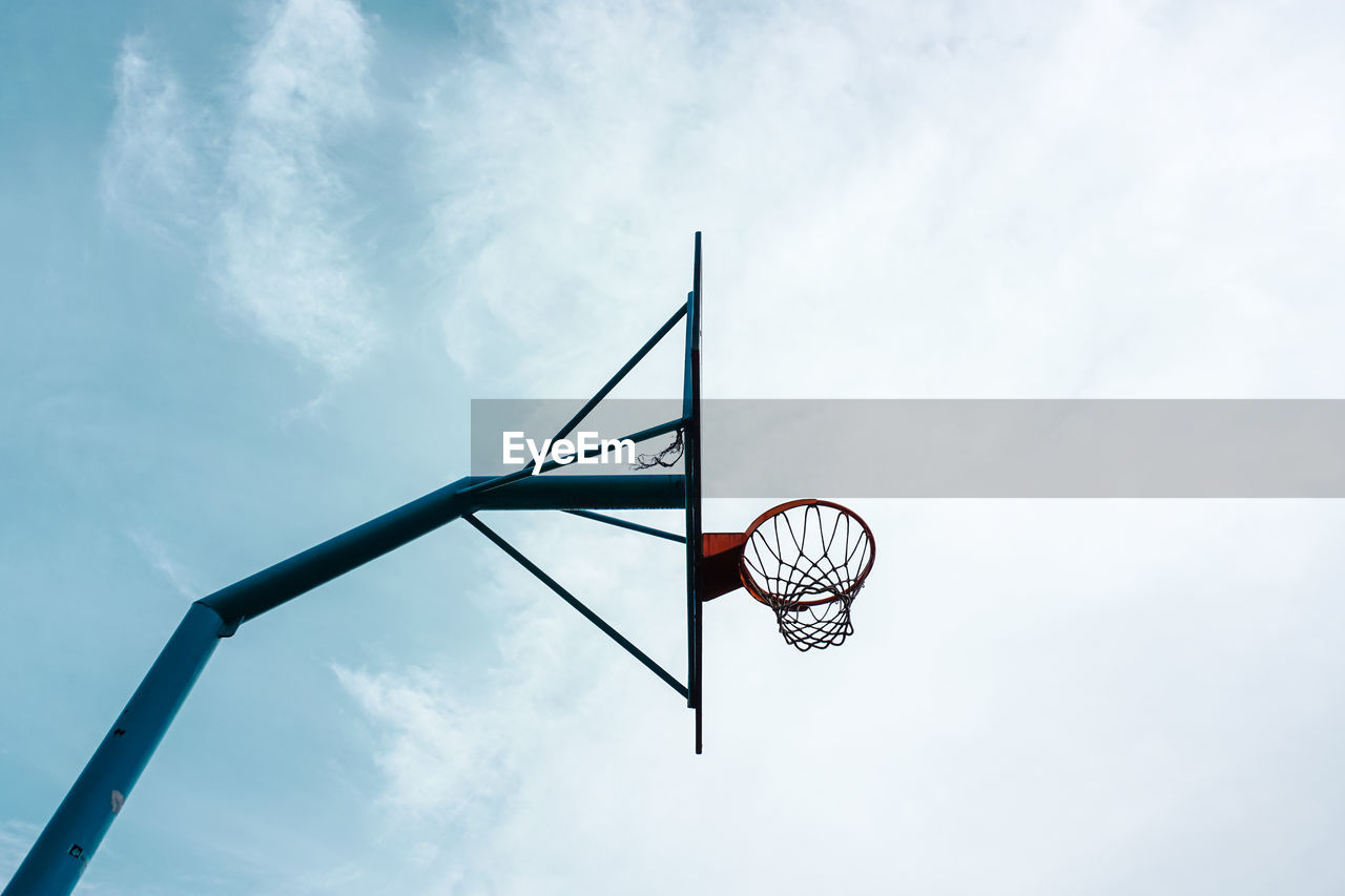 Street basket hoop and blue sky