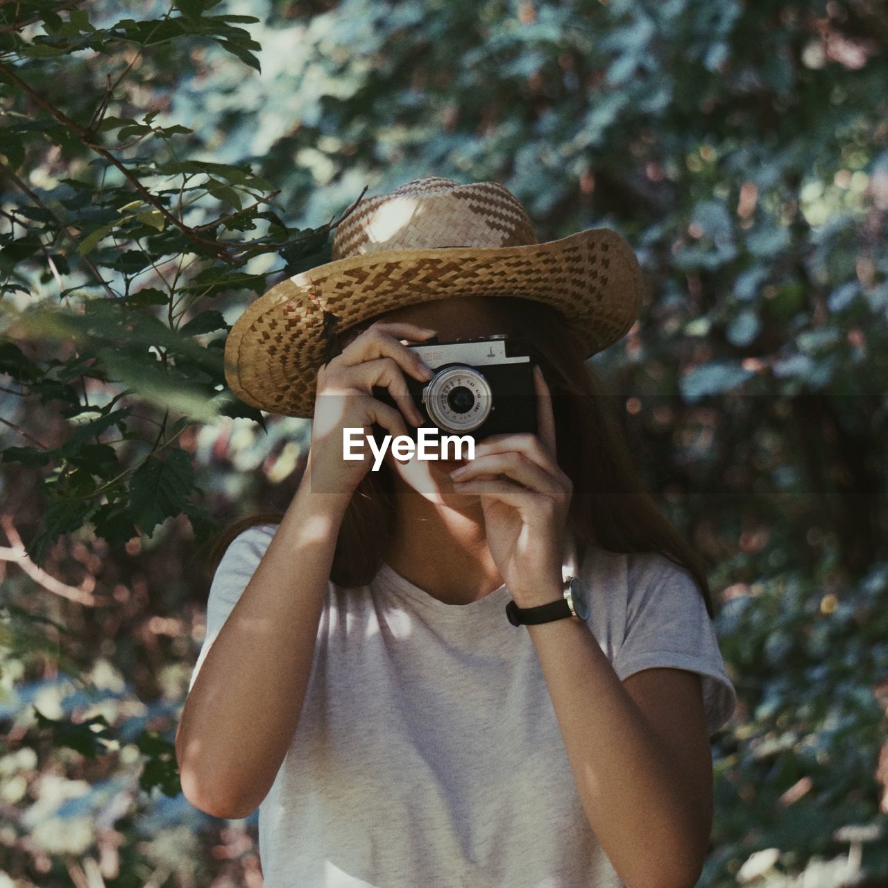 Woman photographing outdoors