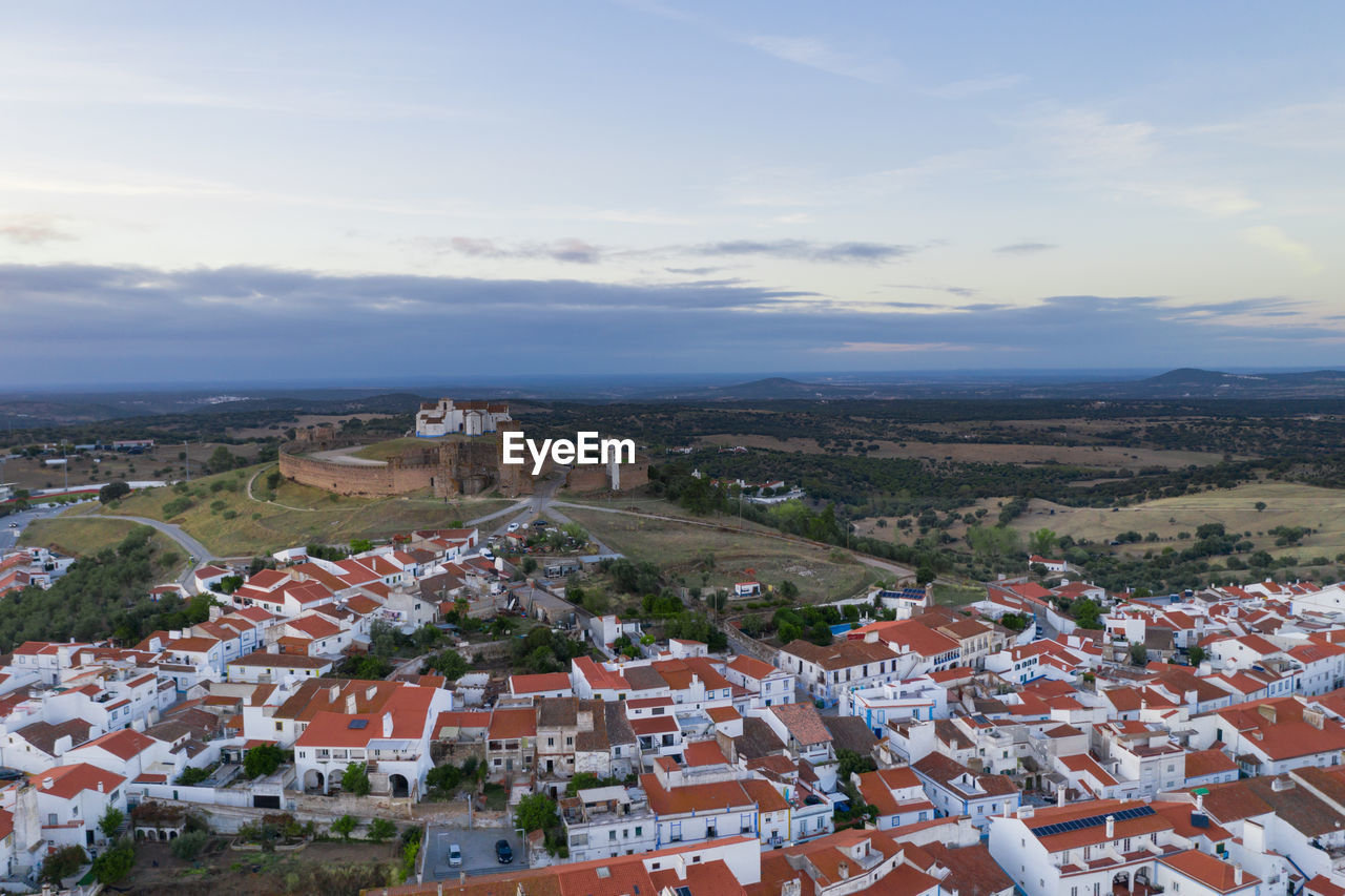 Arraiolos village drone aerial view at sunset in alentejo, portugal