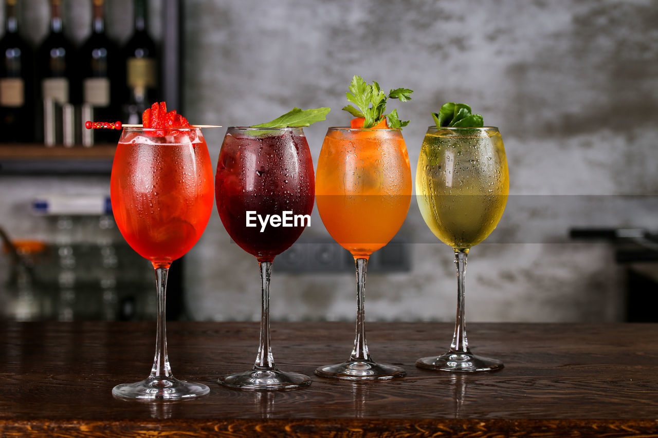 Close-up of colorful drinks on table