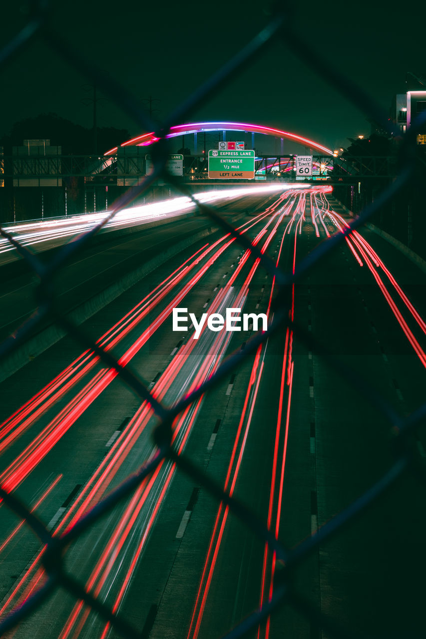 High angle view of light trails on road in city