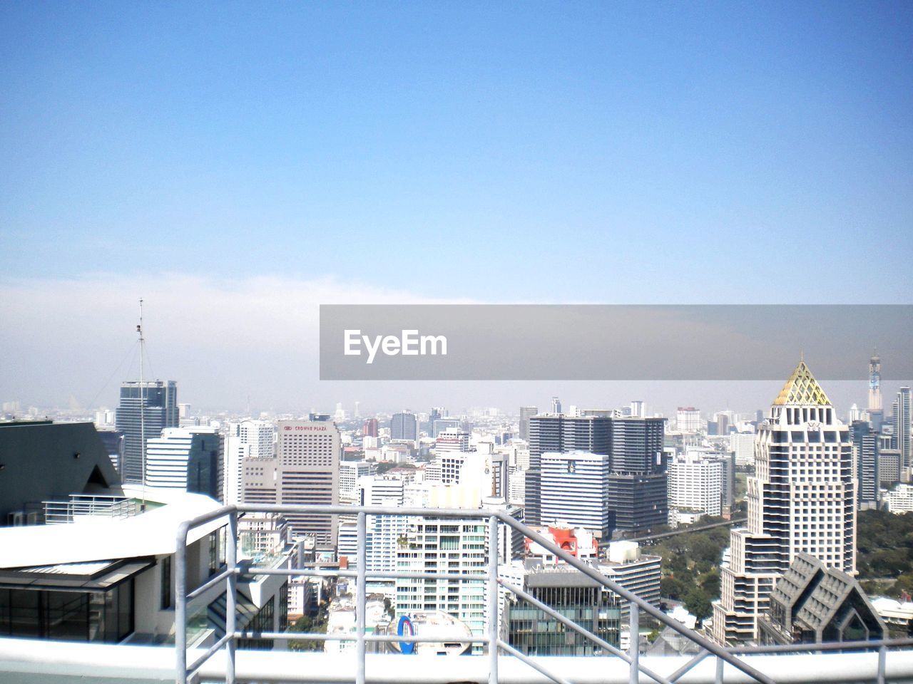 HIGH ANGLE VIEW OF BUILDINGS AGAINST SKY