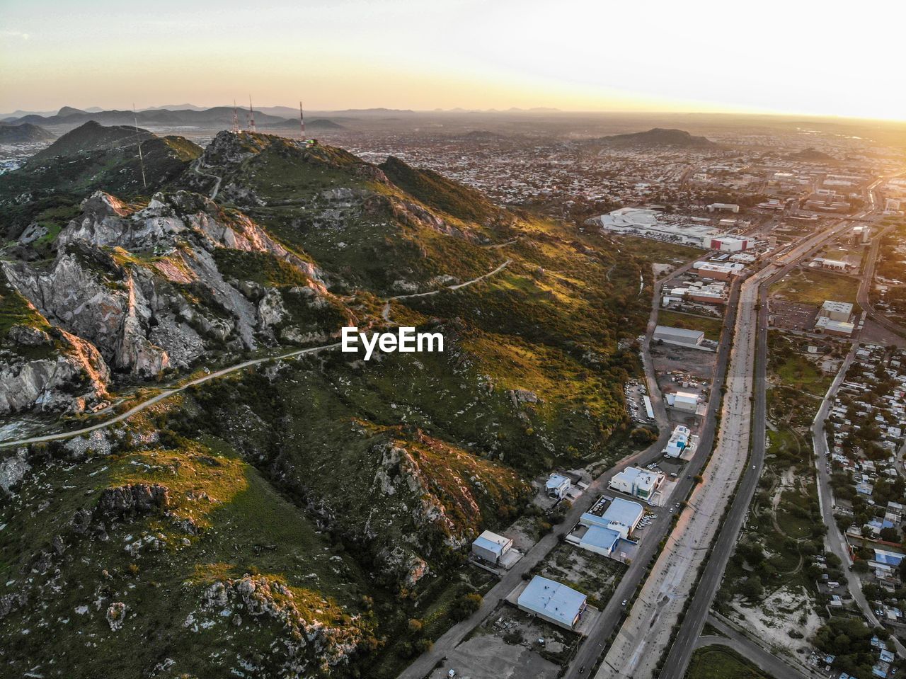 High angle view of road amidst buildings in city