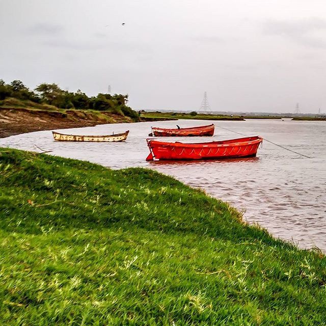 VIEW OF BOATS IN RIVER