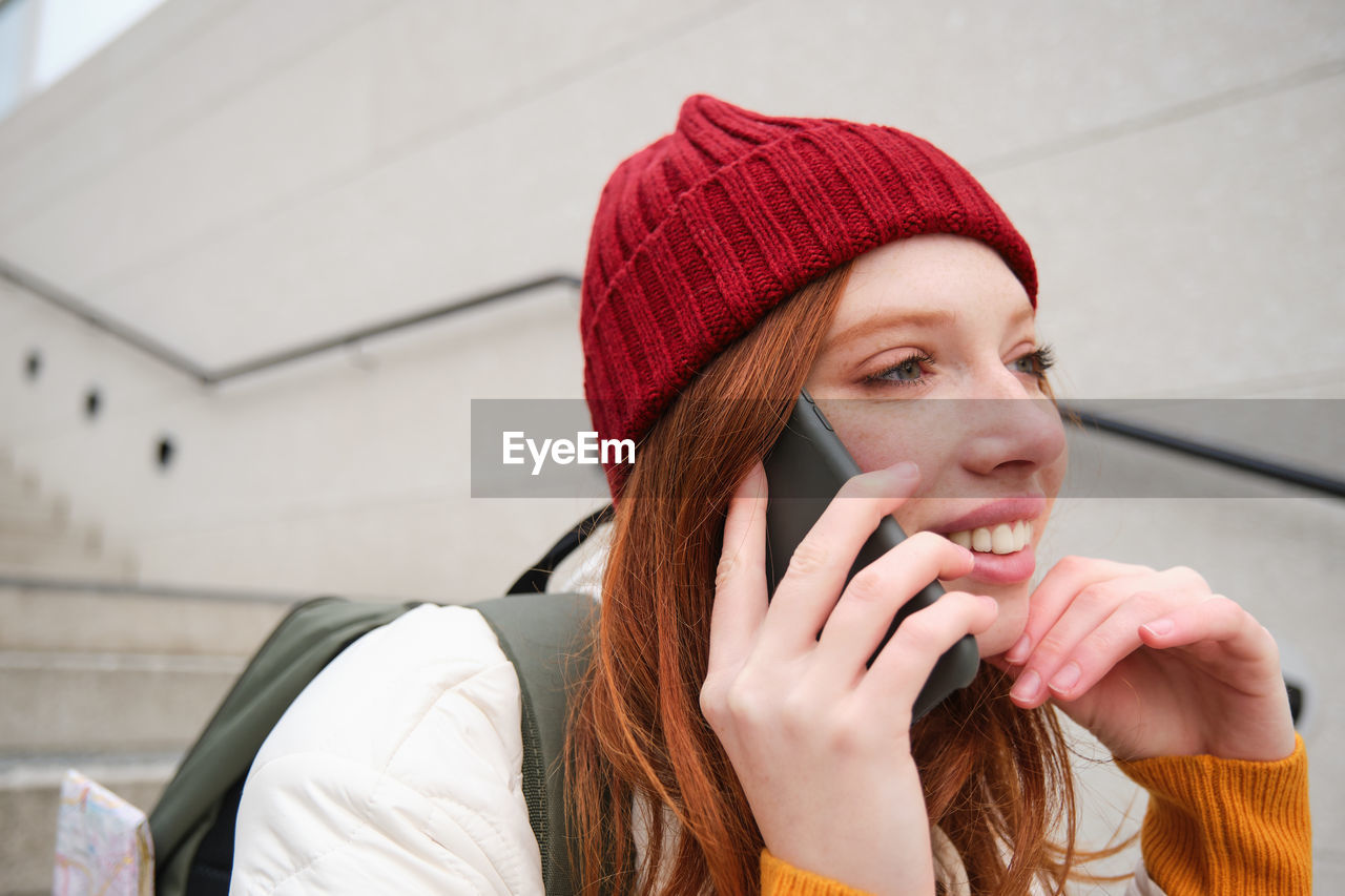 close-up of young woman using mobile phone