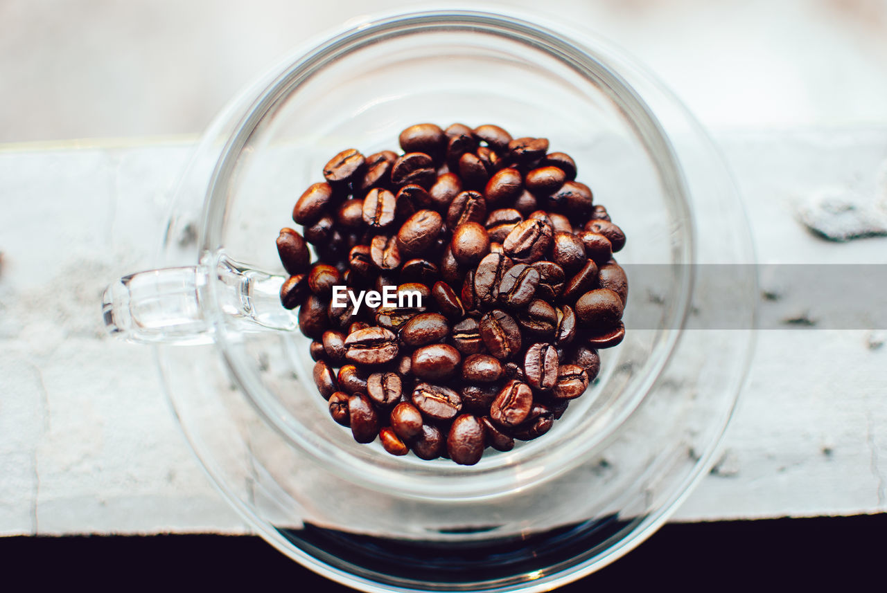 HIGH ANGLE VIEW OF COFFEE BEANS ON TABLE