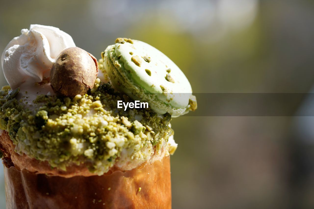 CLOSE-UP OF ICE CREAM CONE