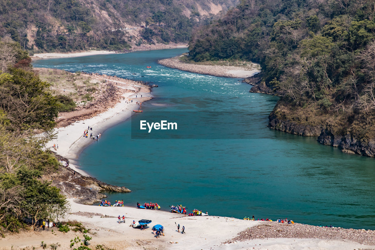 High angle view of people on the banks of ganga river in rishikesh, india