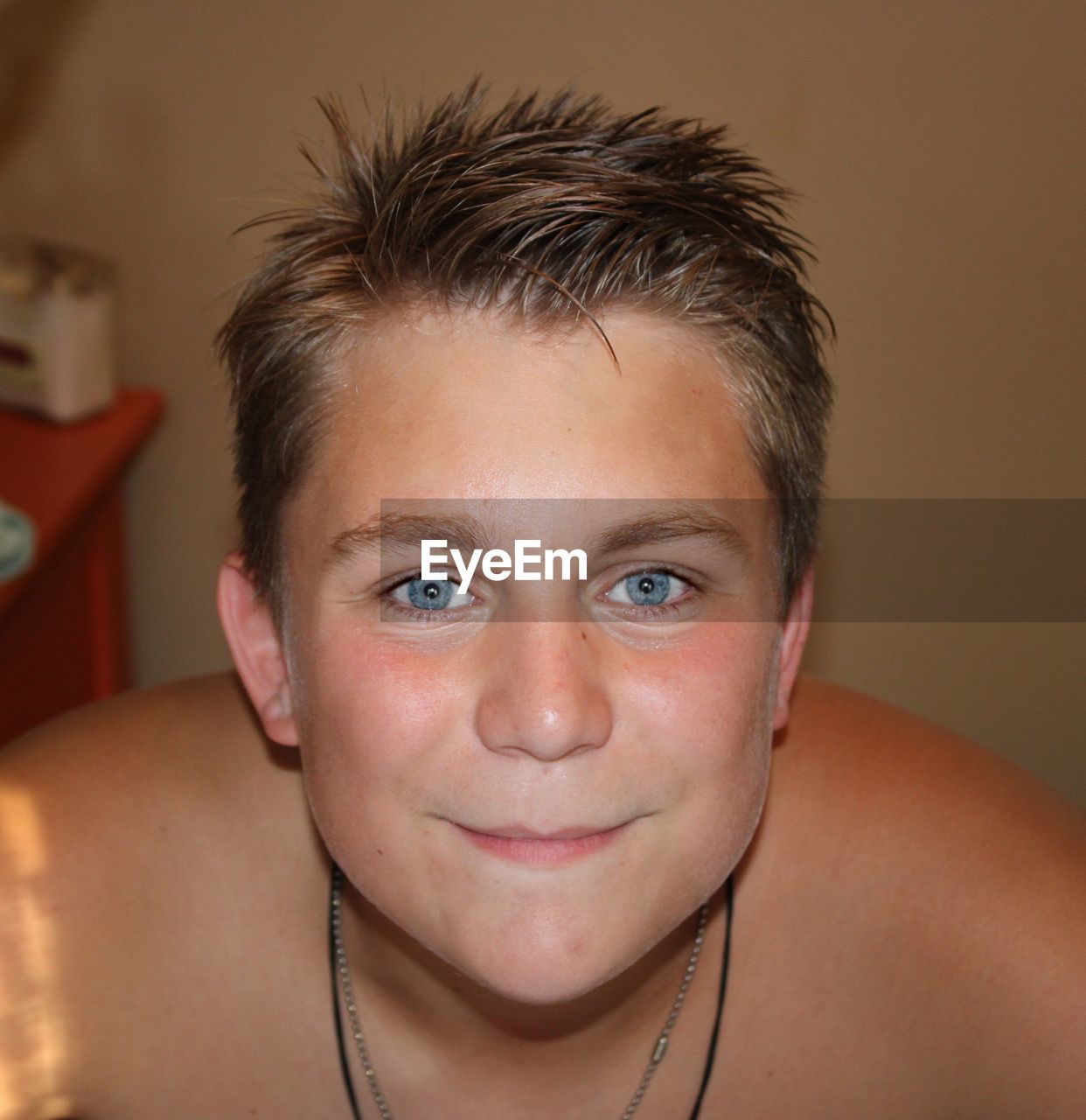 Teen male smiling. beautiful blue eyes 
