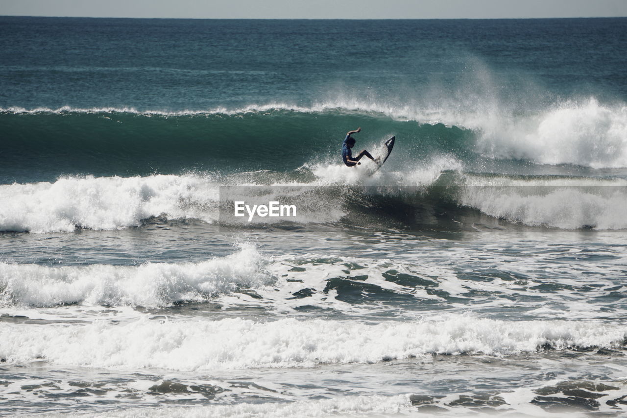 Man surfing in sea