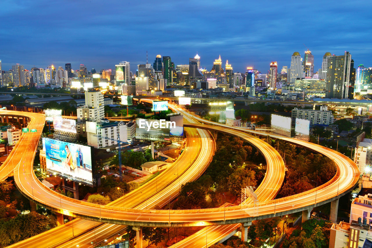 High angle view of light trails on road in city