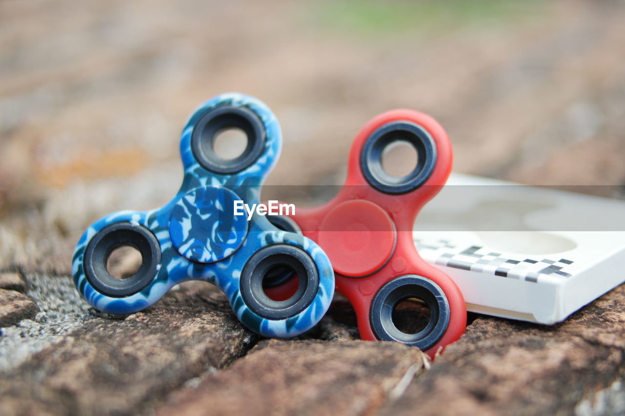 Close-up of toys on table  handspinmer 