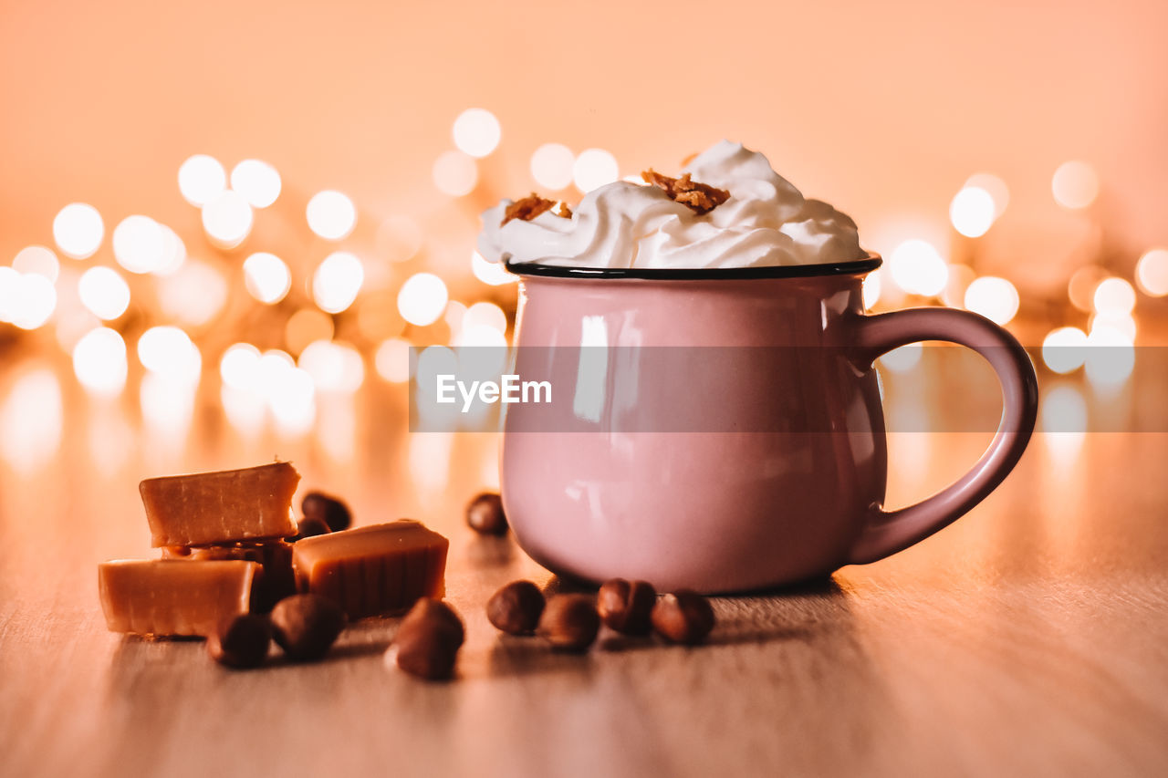 Close-up of coffee cup on table