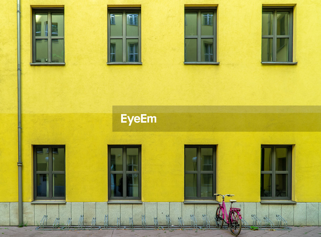 Windows on yellow building