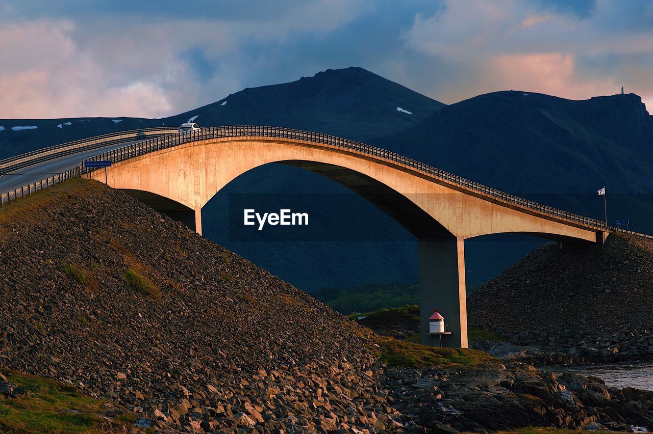 Bridge over road against sky