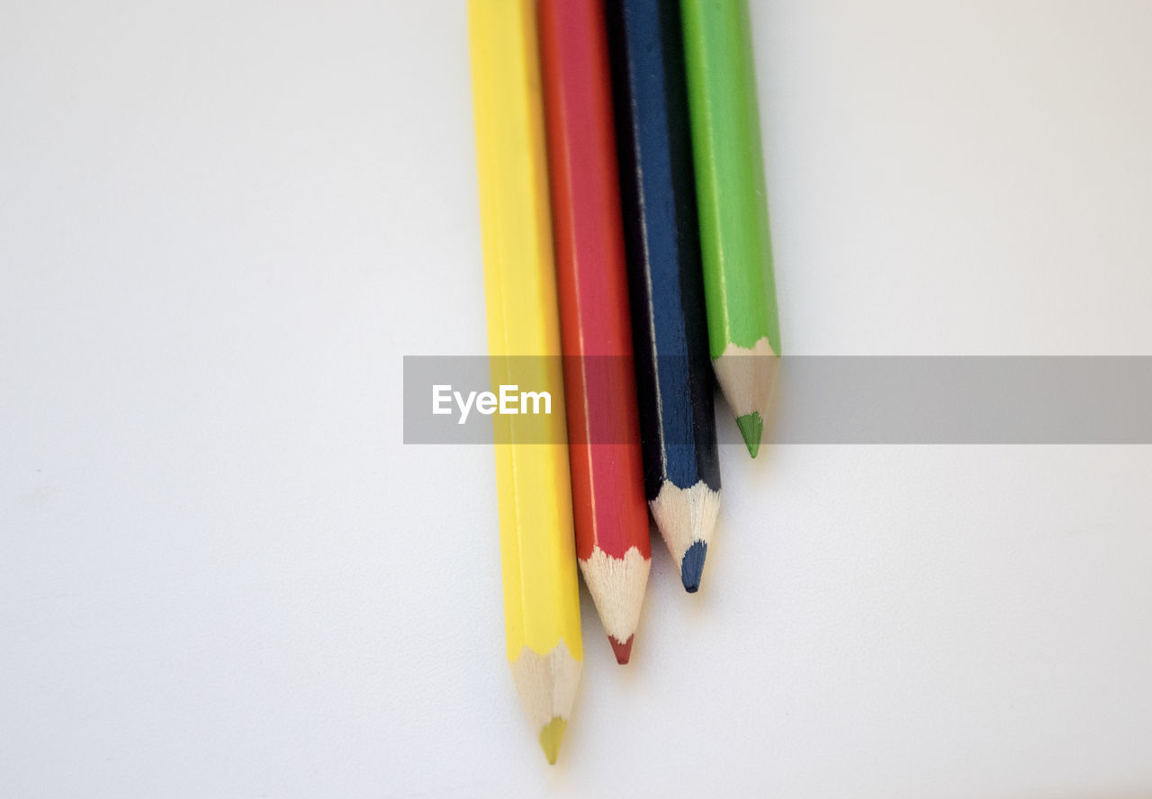 High angle view of colorful pencils on table